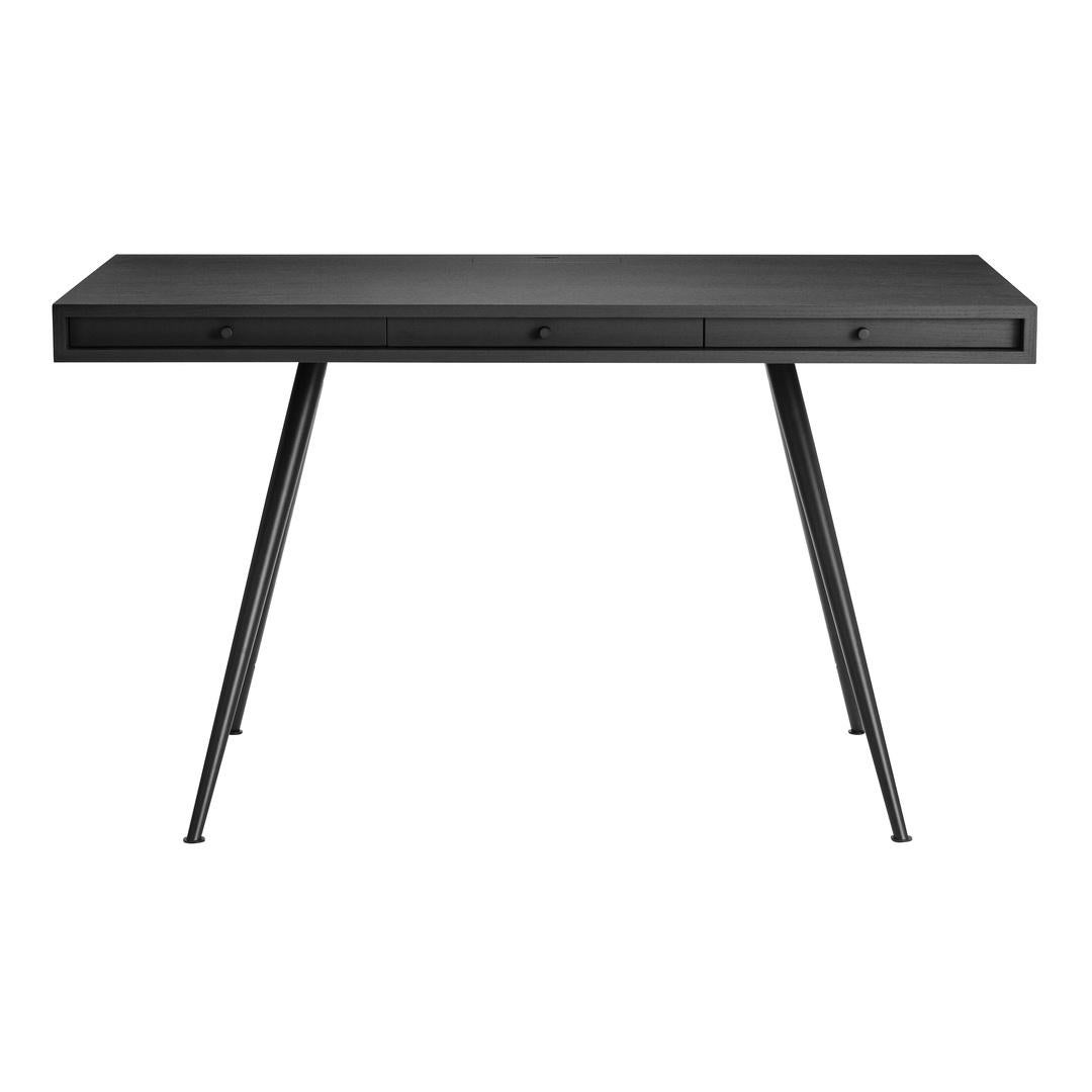 'JFK' Home Desk
Signed by Kristian Sofus Hansen & Tommy Hyldahl for NORR11

Dimensions: 
H. 76 cm x W. 130 cm x D. 65 cm 

Model shown: Black Ash Wood 
Aluminium legs in matte black finish

_________________

With its pure and simplistic design, the