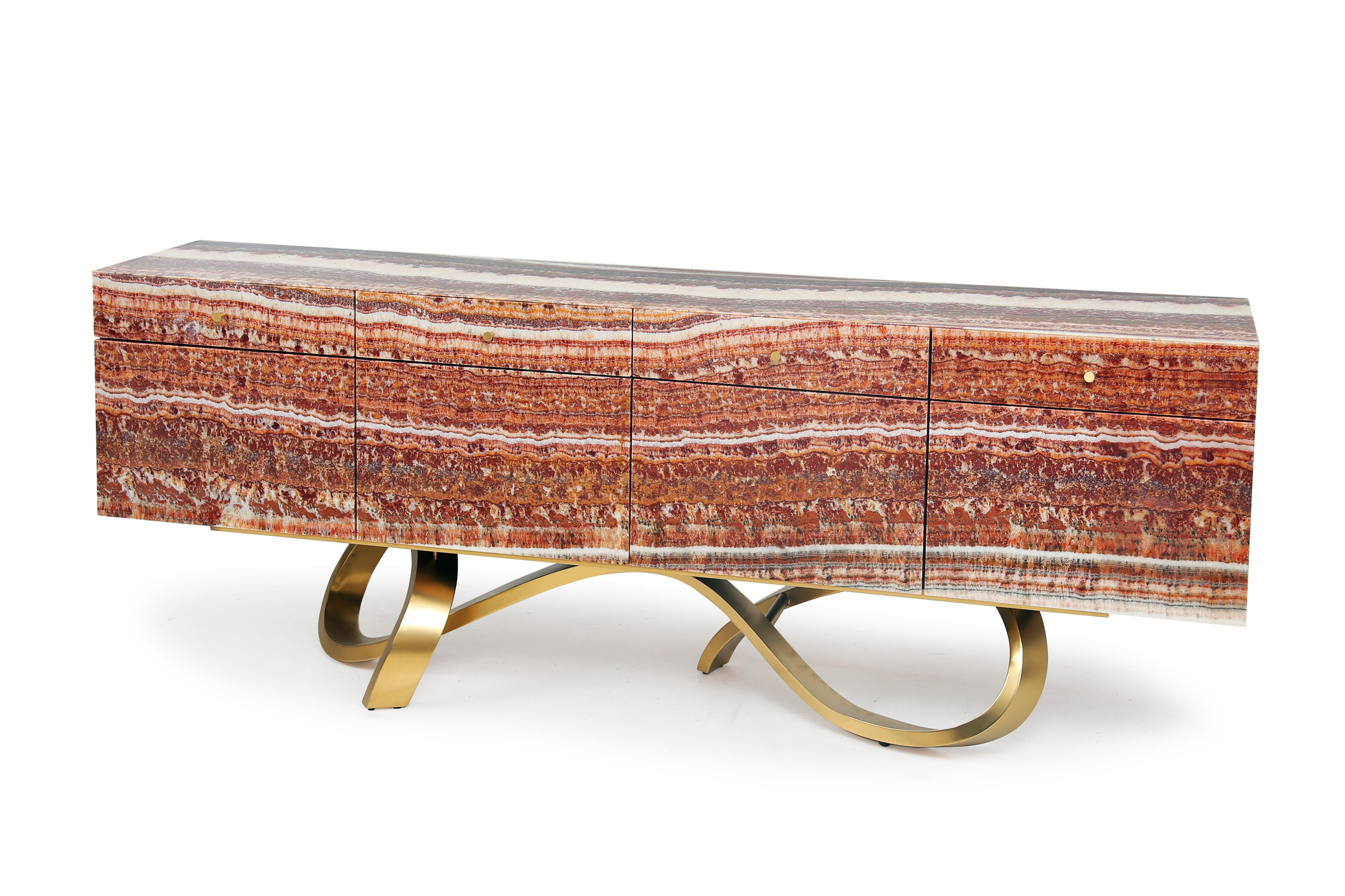 Sideboard Diablo

The Exclusive Red Passion Onyx stone Luxury Sideboard, the perfect union of materials, a harmony of forms. A luxurious seductive piece, handcrafted by Railis Design craftsmen with superb attention to detail. This unique sideboard
