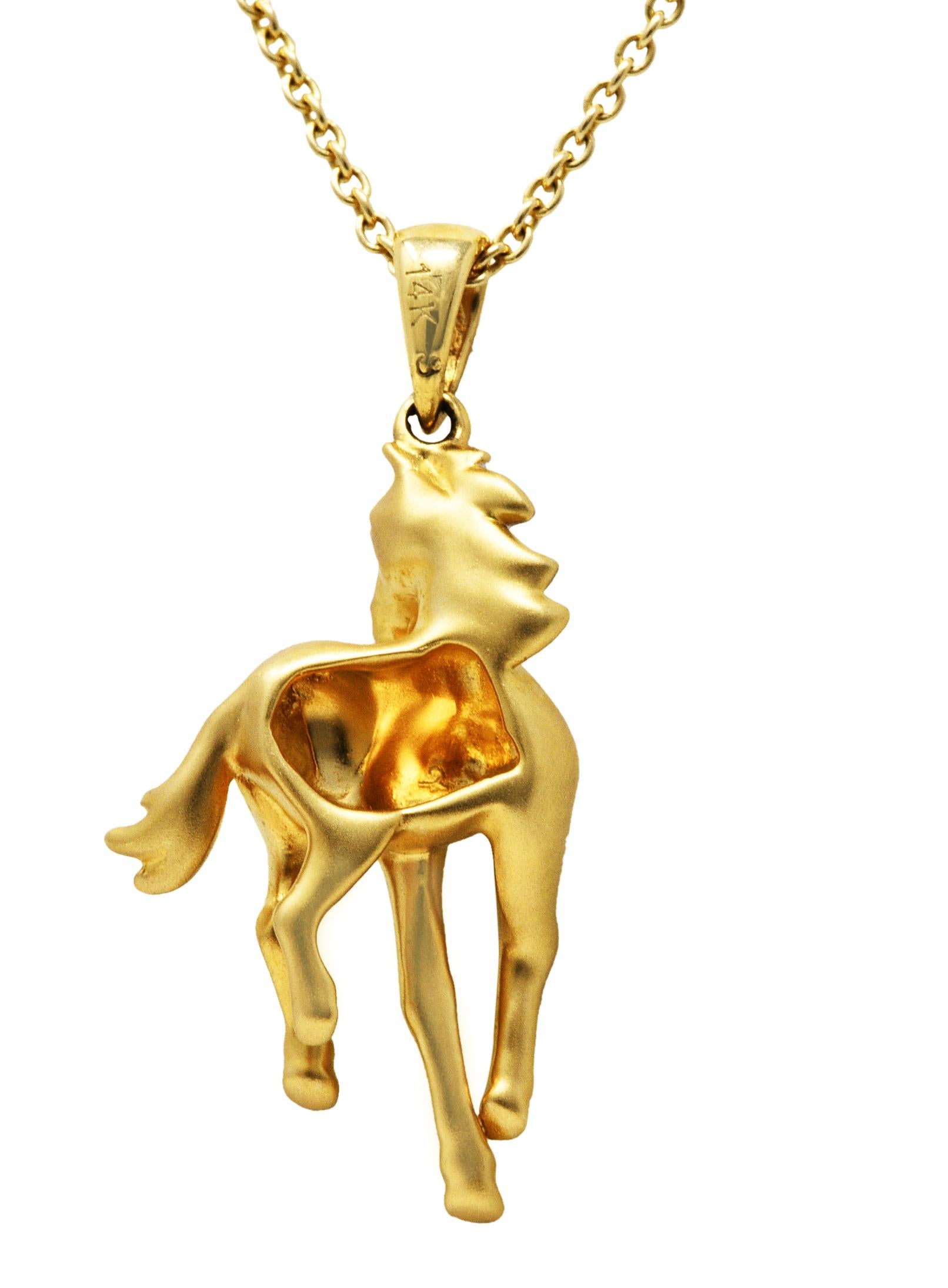 gold polo pendant