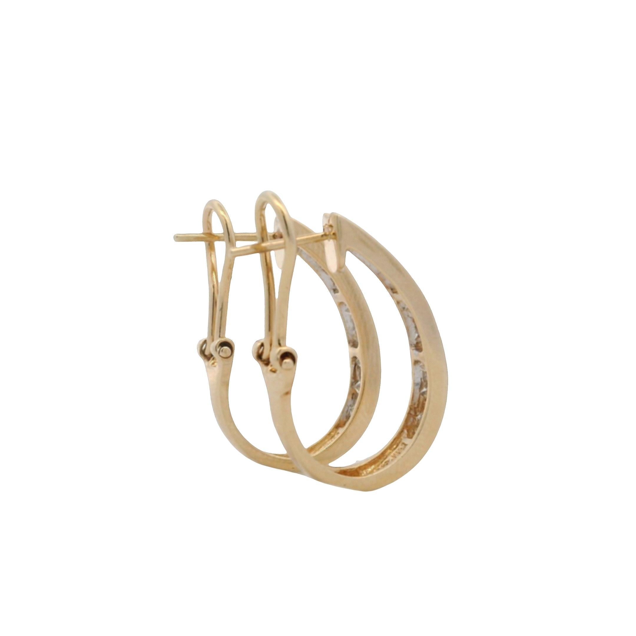 Pendientes de aro ovalados de oro amarillo de 14k con diamante contemporáneo y reverso omega en venta 2