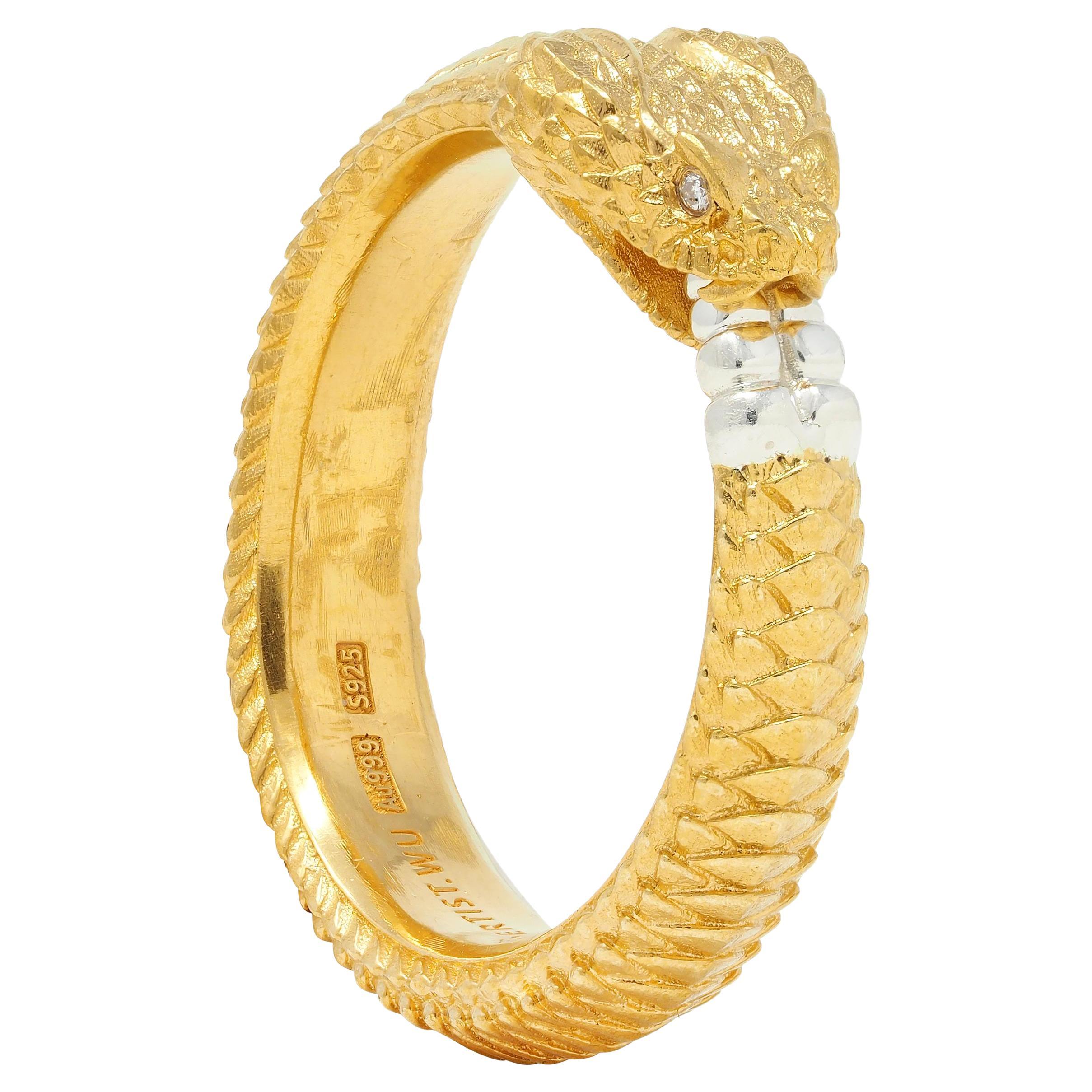 Contemporary Diamond 24 Karat Yellow Gold Sterling Silver Ouroboros Snake Ring For Sale