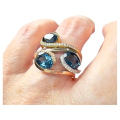 Contemporary  Diamond and Cobalt Topaz Tri-Color Gold Ring