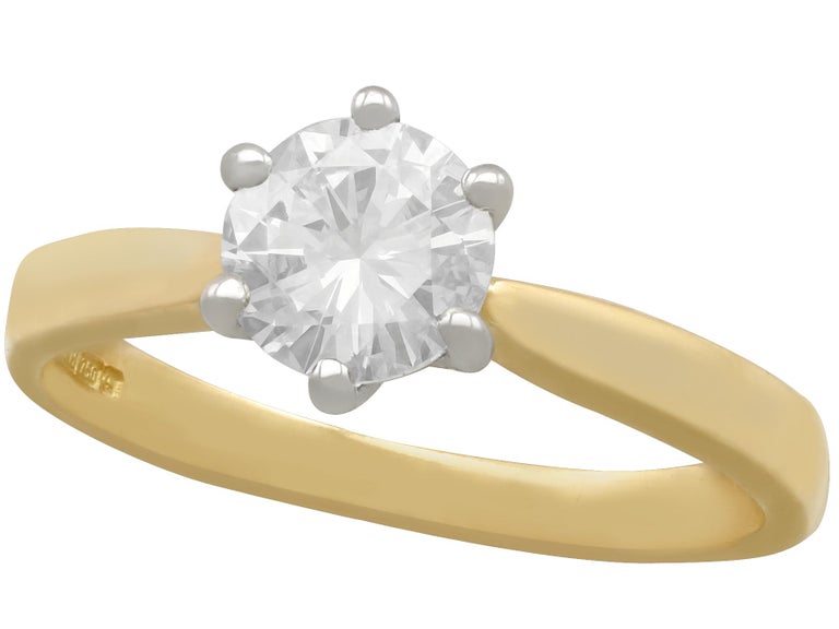 Contemporary Diamond and Gold Solitaire Engagement Ring