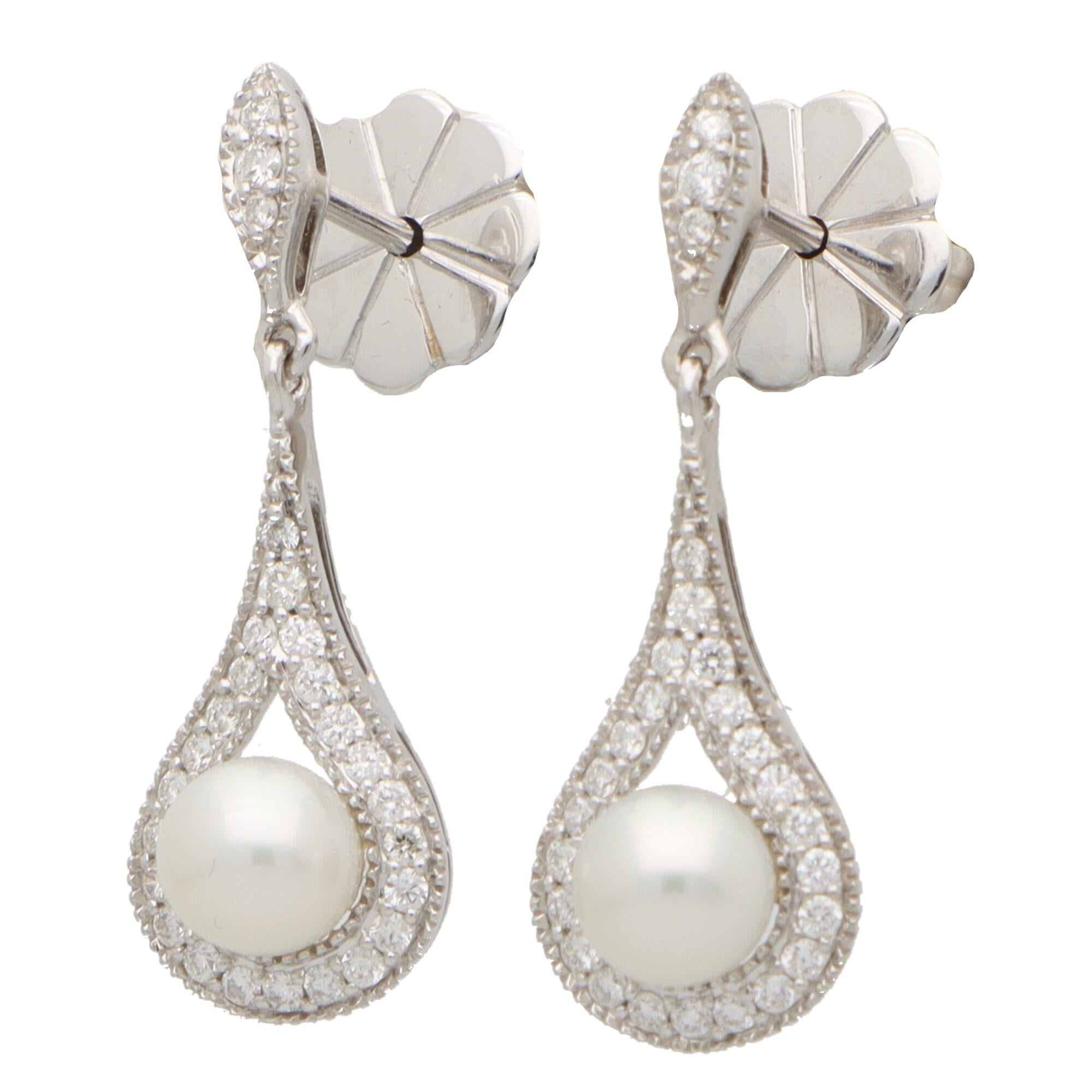 Round Cut Contemporary Diamond and Pearl Drop Earrings Set in 18k White Gold