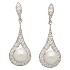 Contemporary Diamond and Pearl Drop Earrings Set in 18k White Gold