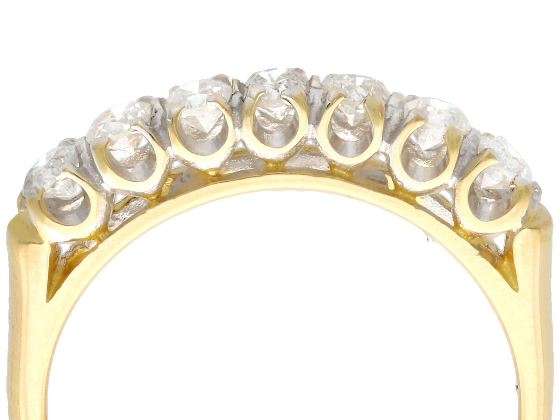 An impressive contemporary 0.56 carat diamond and 18k yellow gold, 18k white gold set half eternity ring; part of our diverse diamond jewelry collections.

This fine and impressive seven diamond half eternity ring has been crafted in 18k yellow gold