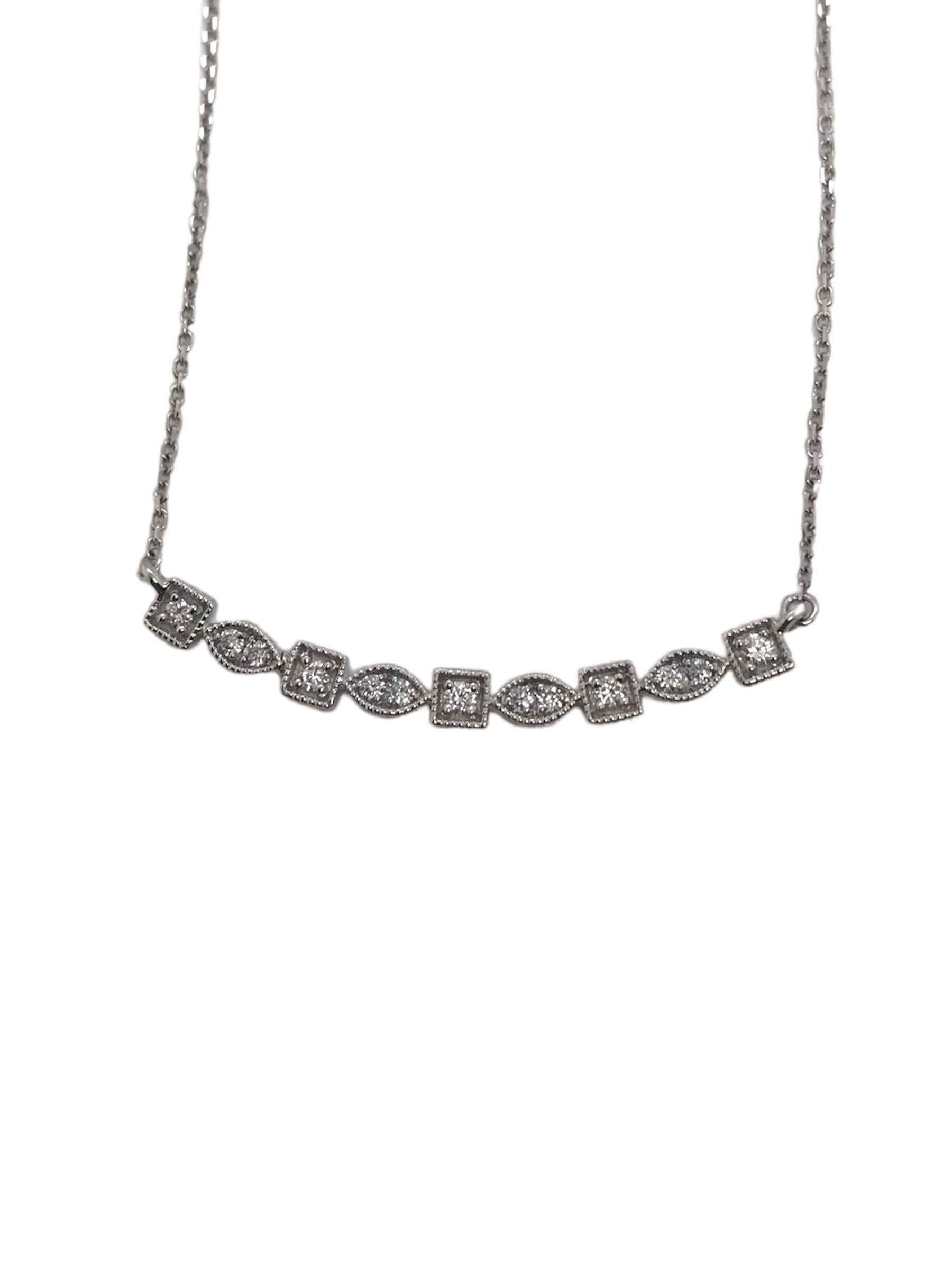 Simple yet stunning!!
This beauty is absolutely perfect for any occasion.

Necklace Details
Material: 14K White Gold
Chain Length: 20 Inches
Weight: 2.8 Grams
Bar Width: 3.15mm

Diamond Details
13 - 1.4mm Round Brilliant Cut Diamonds

Item: 768TMV9