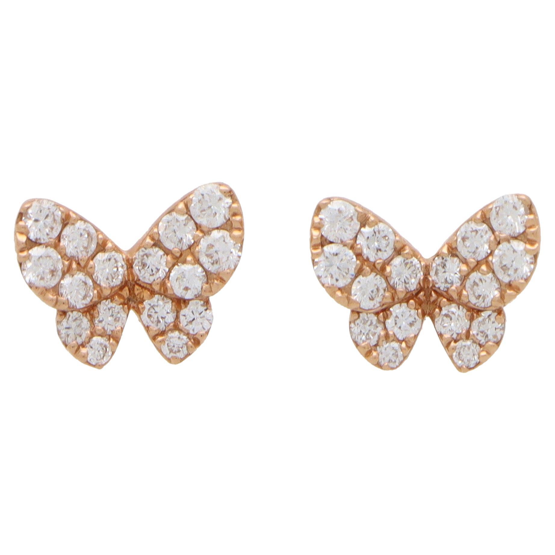 Clous d'oreilles contemporains papillon en or rose 18 carats et diamants