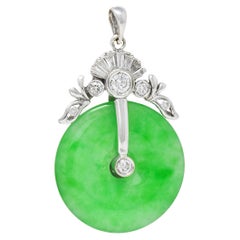 Contemporary Diamond Carved Jade 14 Karat White Gold Pi Disk Pendant