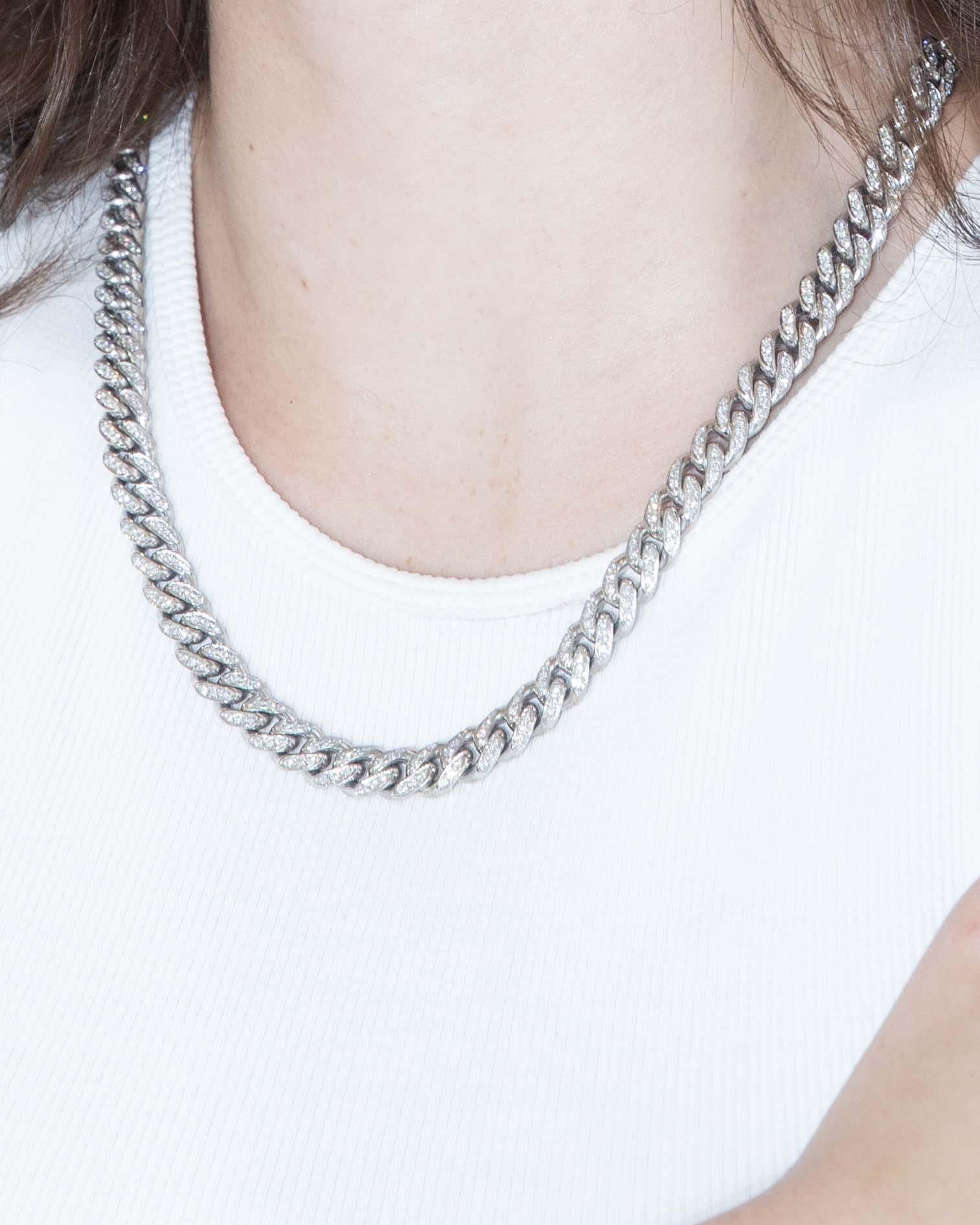 Adorned with 515 glistening diamonds totaling 7.73 carats, the Alvaro Diamond Cuban Chain embodies the essence of refined elegance. Crafted in 18ct white gold, each precisely formed link catches the light with quiet brilliance, echoing stories of