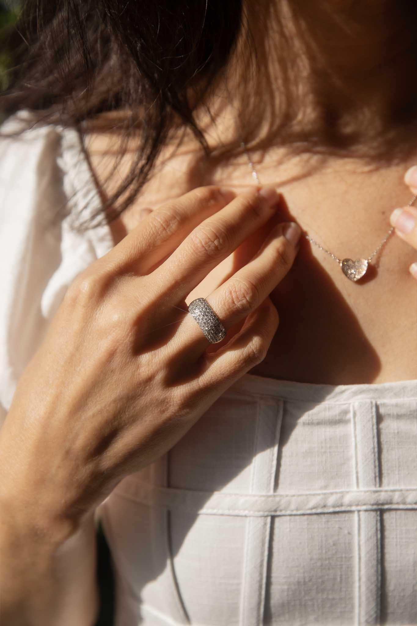 Crafted in 18 carat white gold, our Coco Ring is a glamorous jewel.  Her contemporary dome design is embellished with pave set diamonds that move and sparkle with the light. A lovely inclusion in your jewellery collection.

The Coco Ring Gem