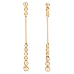 Boucles d'oreilles pendantes contemporaines en or jaune 18 carats avec diamants