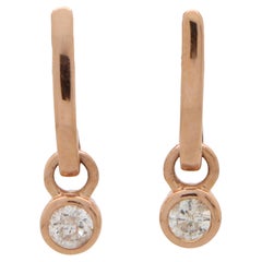 Orecchini a cerchio a goccia con diamante in oro rosa 14 carati