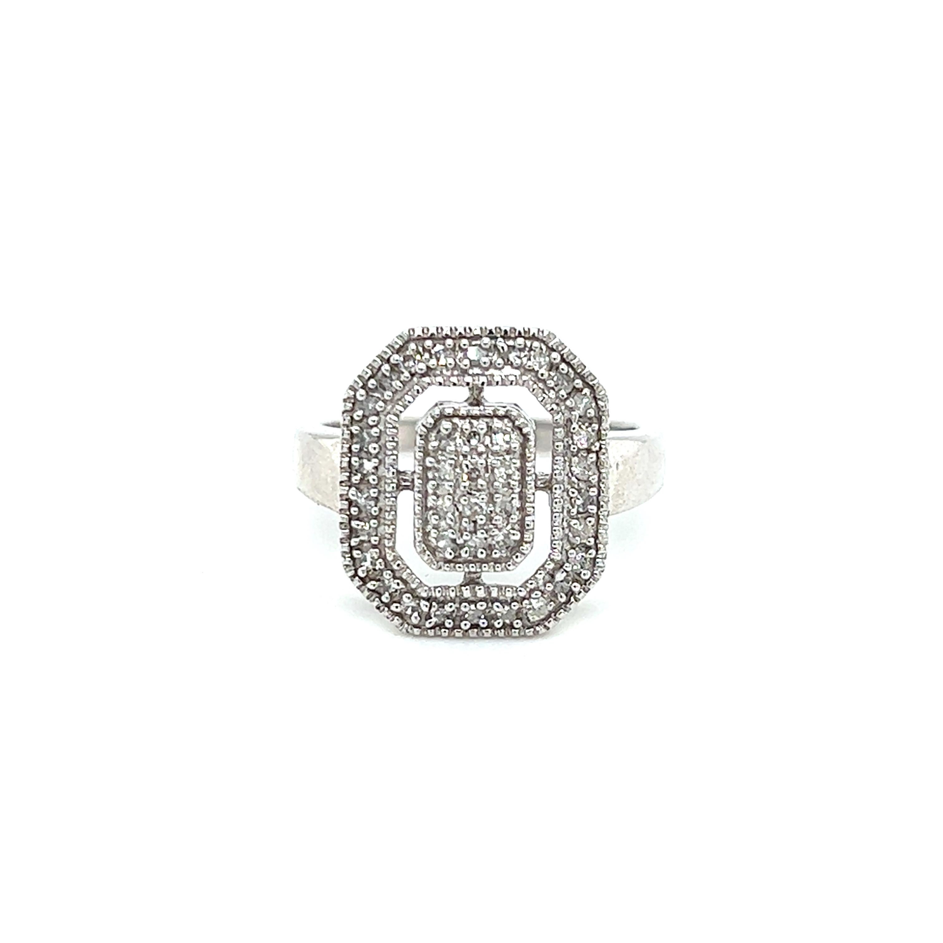 One 10-karat white gold diamond cluster ring set with thirty-eight (38) brilliant cut diamonds, approximately 0.65-carat total weight with matching H/I color and I1 clarity. The ring is a finger size 7 and is resizable.  Sizing is not included.  