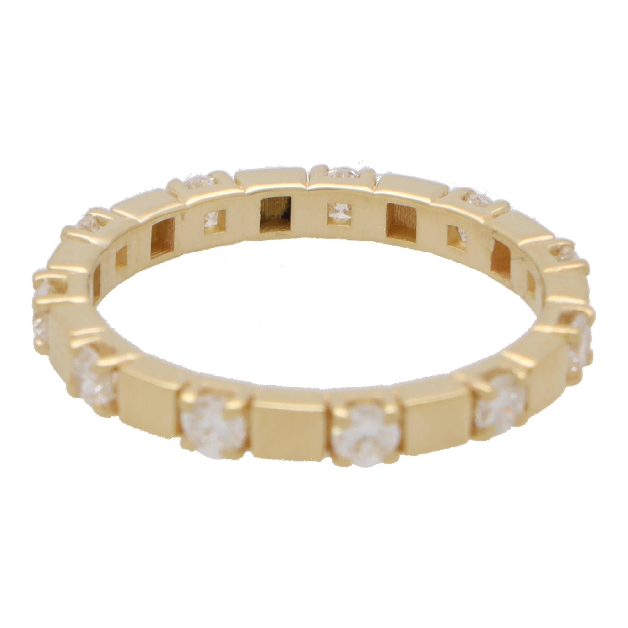 A unique contemporary diamond full eternity ring set in 18k yellow gold.

The eternity ring is set with exactly 11 round brilliant cut diamonds; all of which are claw set within a 2.5-millimetre band (there is a height of 2-millimetres). What makes