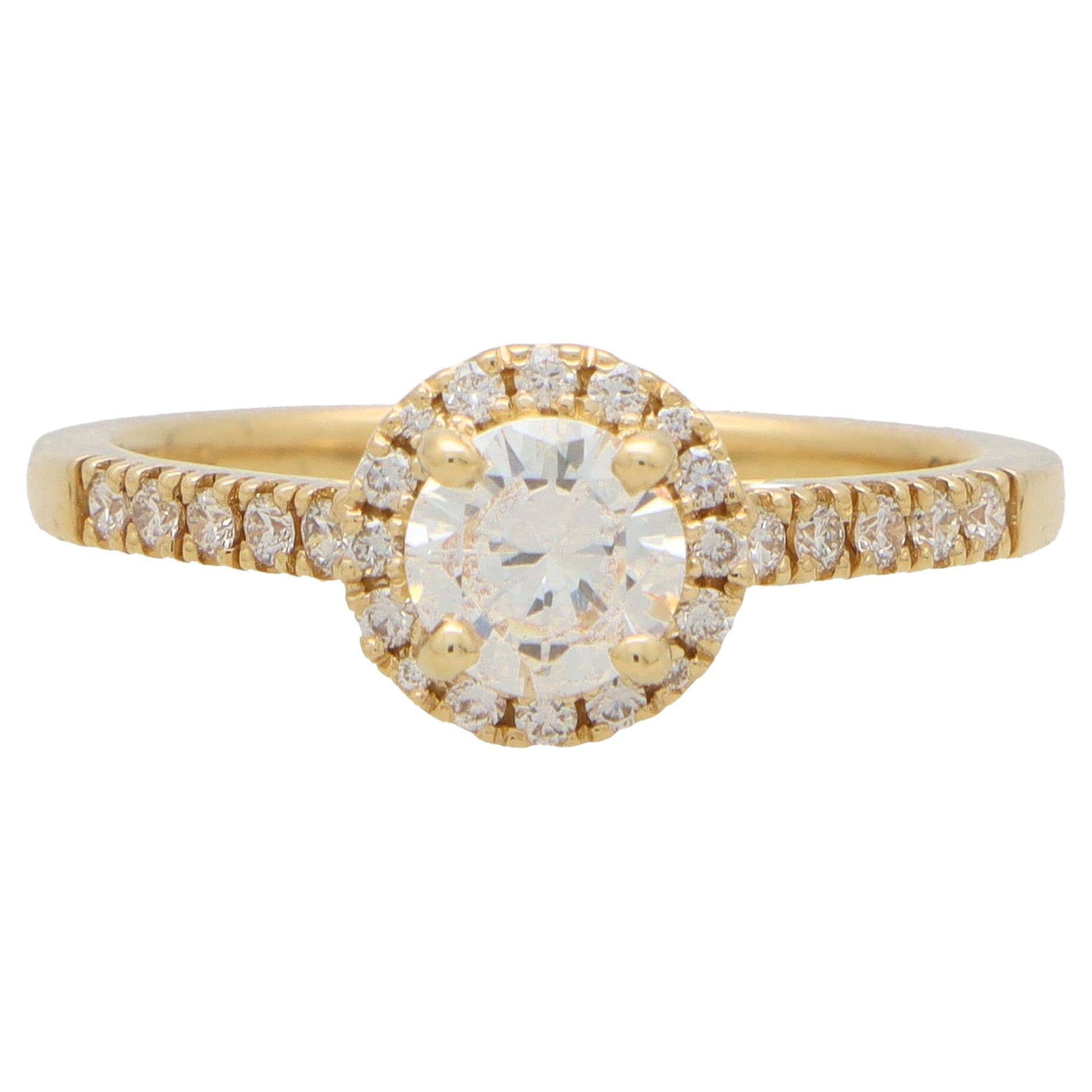 Contemporary Diamond Halo Ring Set in 18k Yellow Gold For Sale