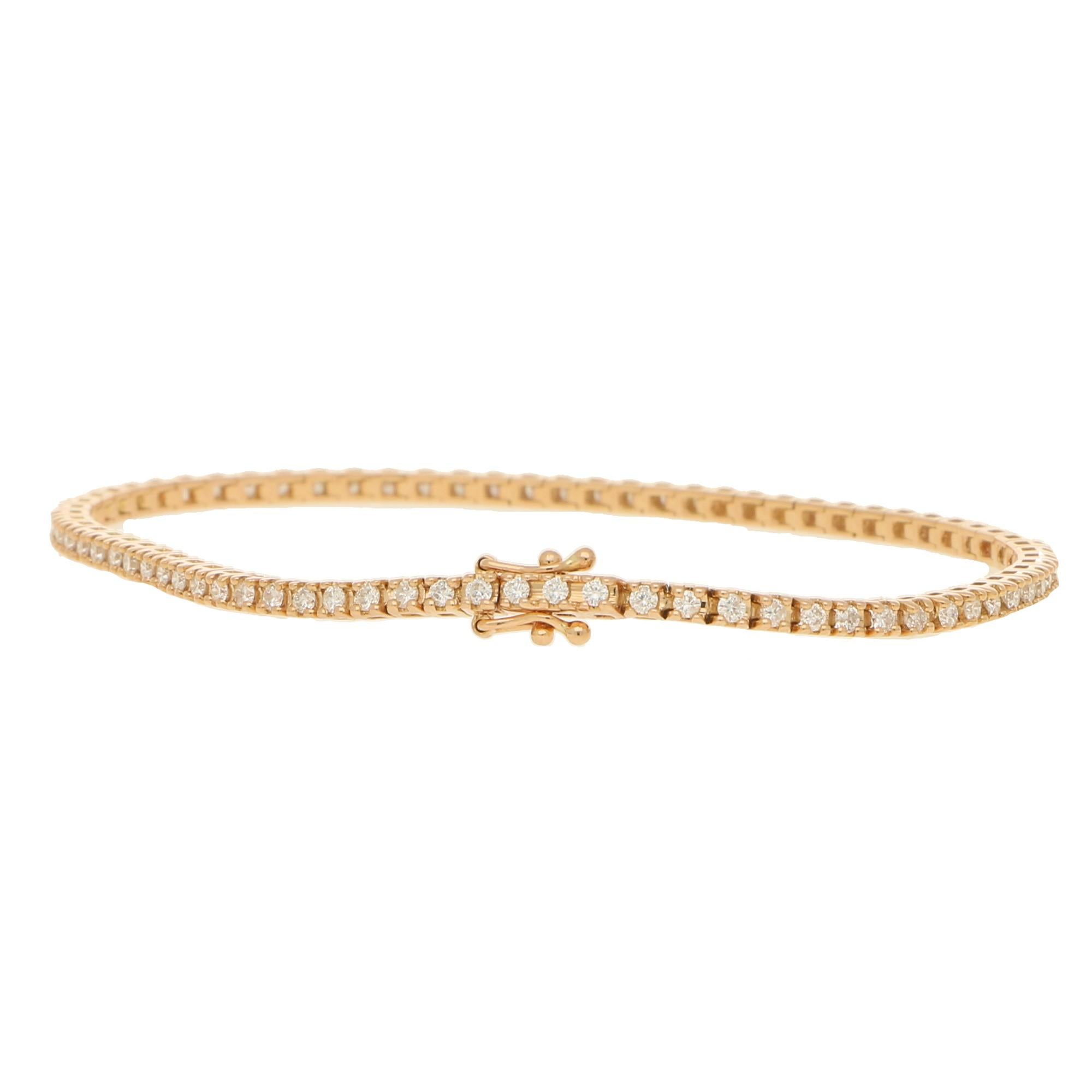 A classic diamond line bracelet set in 18k rose gold.

The bracelet is composed of exactly 75 round brilliant cut diamonds which are all seamlessly set in articulated claw settings. This particular design is a firm favourite as it can be worn for a