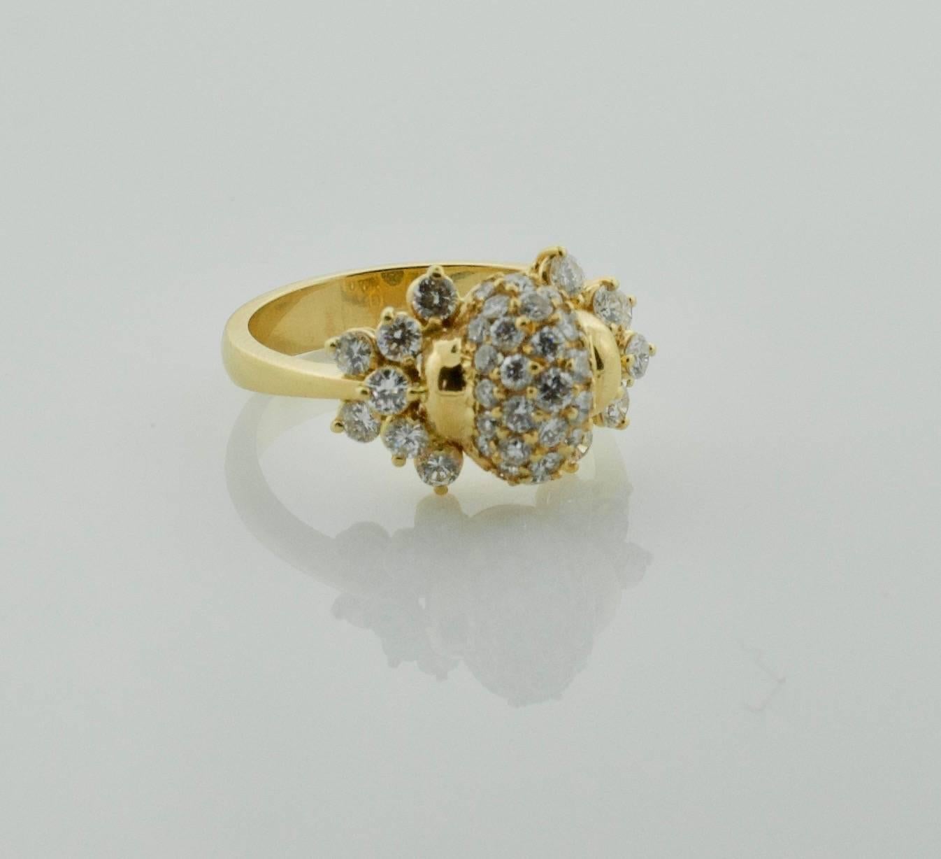 A Contemporary Diamond Ring in 18k Yellow Gold
Beautifully made with Fine Diamonds and Setting Work
Forty Nine Round Brilliant Cut Diamonds weighing 1.55 carats approximately GH VVS-VS
size 7