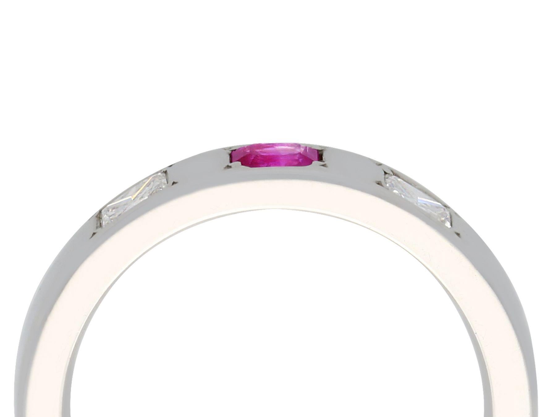 A very good contemporary princess cut 0.25 carat diamond and 0.13 carat natural ruby, 18 karat white gold ladies ring; part of our contemporary jewelry and estate jewelry collections

This diamond and ruby band ring has been crafted in 18k white