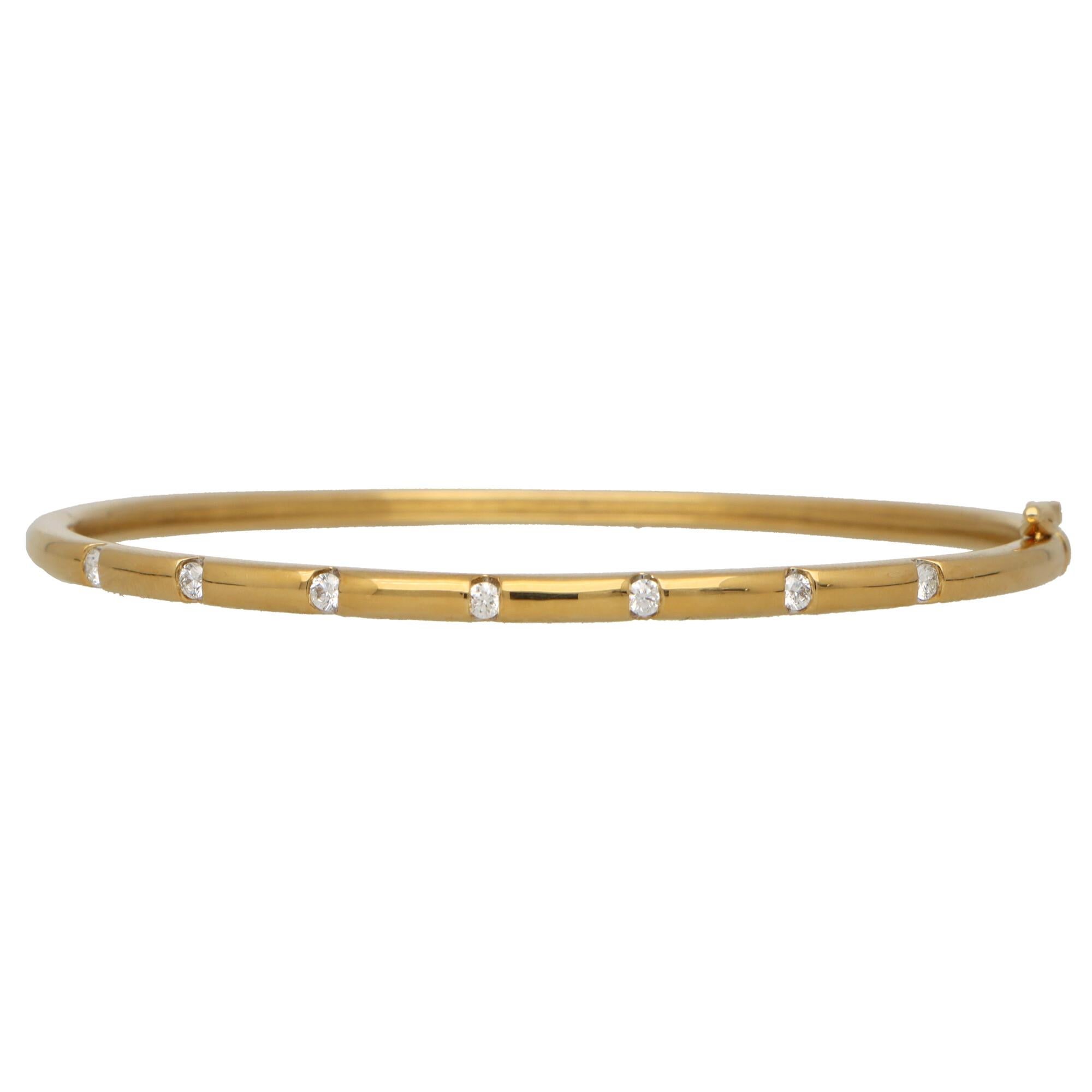 Contemporary Diamond Set Bangle in 18k Yellow Gold In Good Condition In London, GB