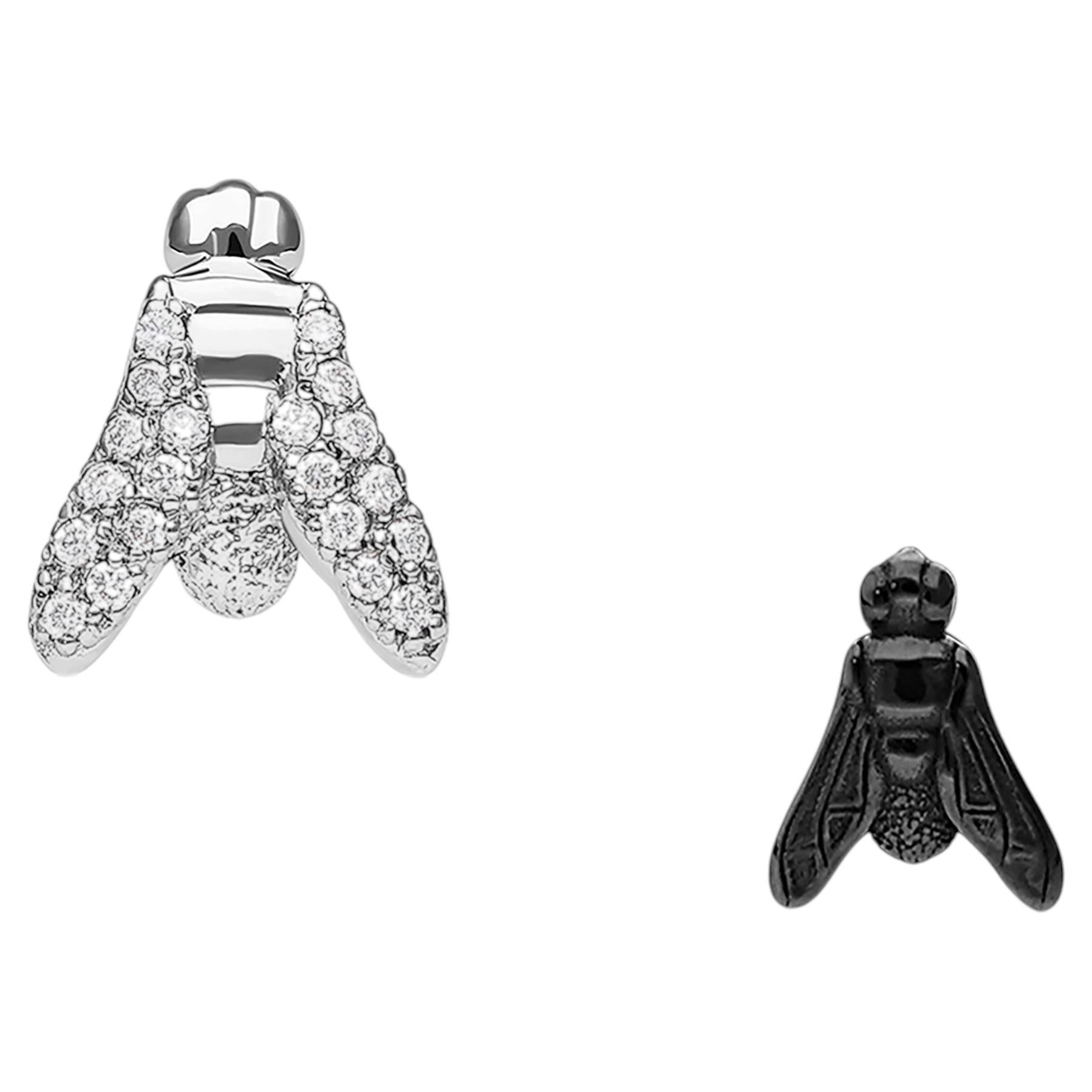 Orecchini contemporanei con diamanti incastonati in oro bianco e nero 18 carati