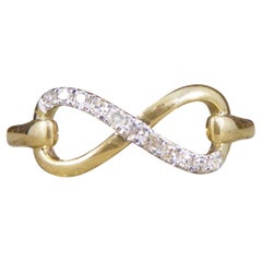 Contemporary Diamond Set Infinity Love Ring in 9ct Yellow Gold