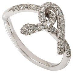 Bague contemporaine « serpent » en or blanc sertie d'un diamant