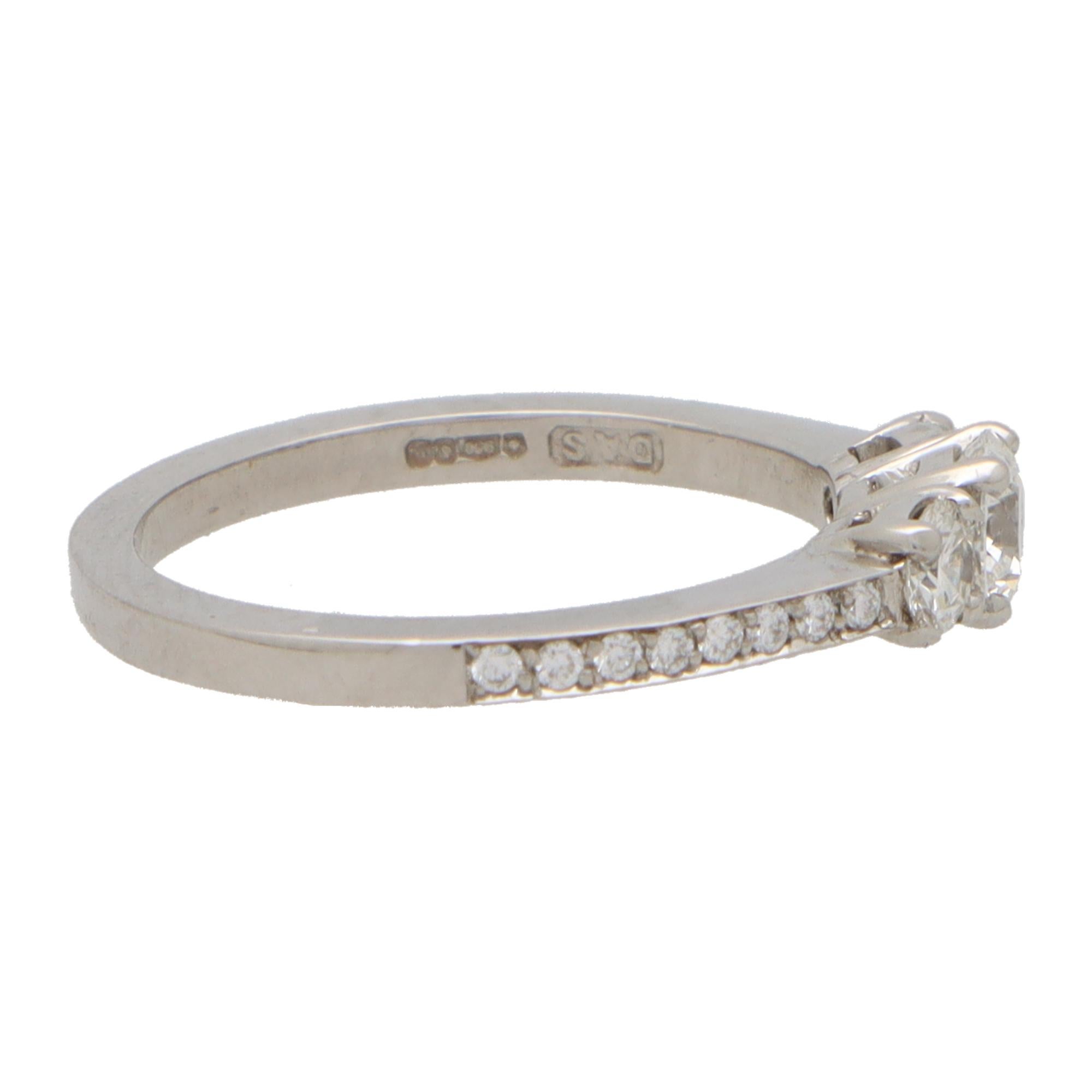 Women's or Men's Contemporary Diamond Three Stone Ring With Diamond Shoulders in Platinum