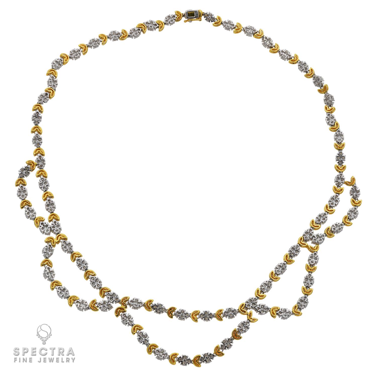 A splendid necklace embellished with white round diamonds set in 18K white and yellow gold. 

Diamond weight approx. 13.00 carats total, estimated G-H colors, VS-SI clarity. Overall weight approx. 44.27 grams, 18