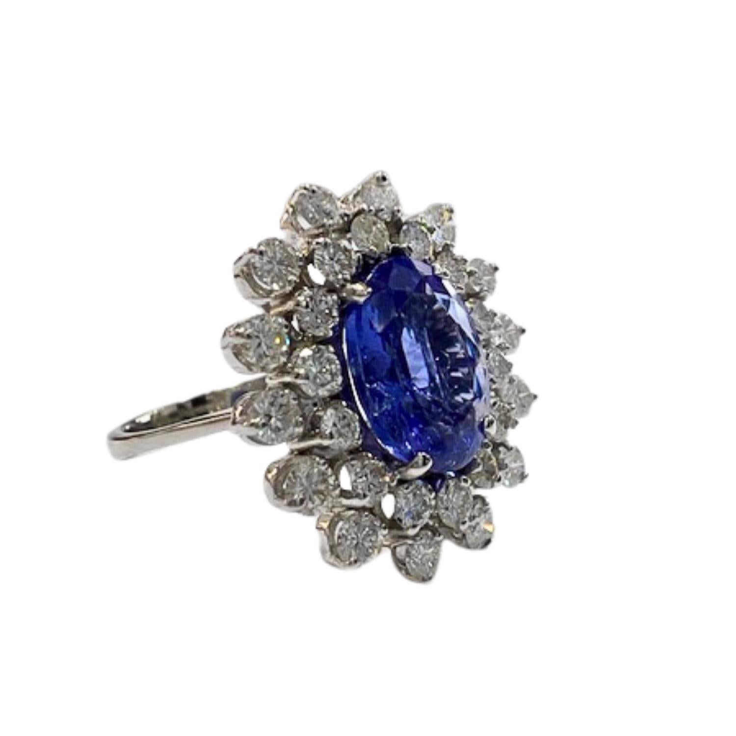 A modern design featuring a stunning combination of diamonds and tanzanite set in 18K gold. Perfect for those who appreciate refined elegance.

Key Features:

Metal: 18K Gold
Main Stone: Tanzanite (2.80 ct, AAA purity)
Accent Stones: 28 Brilliant