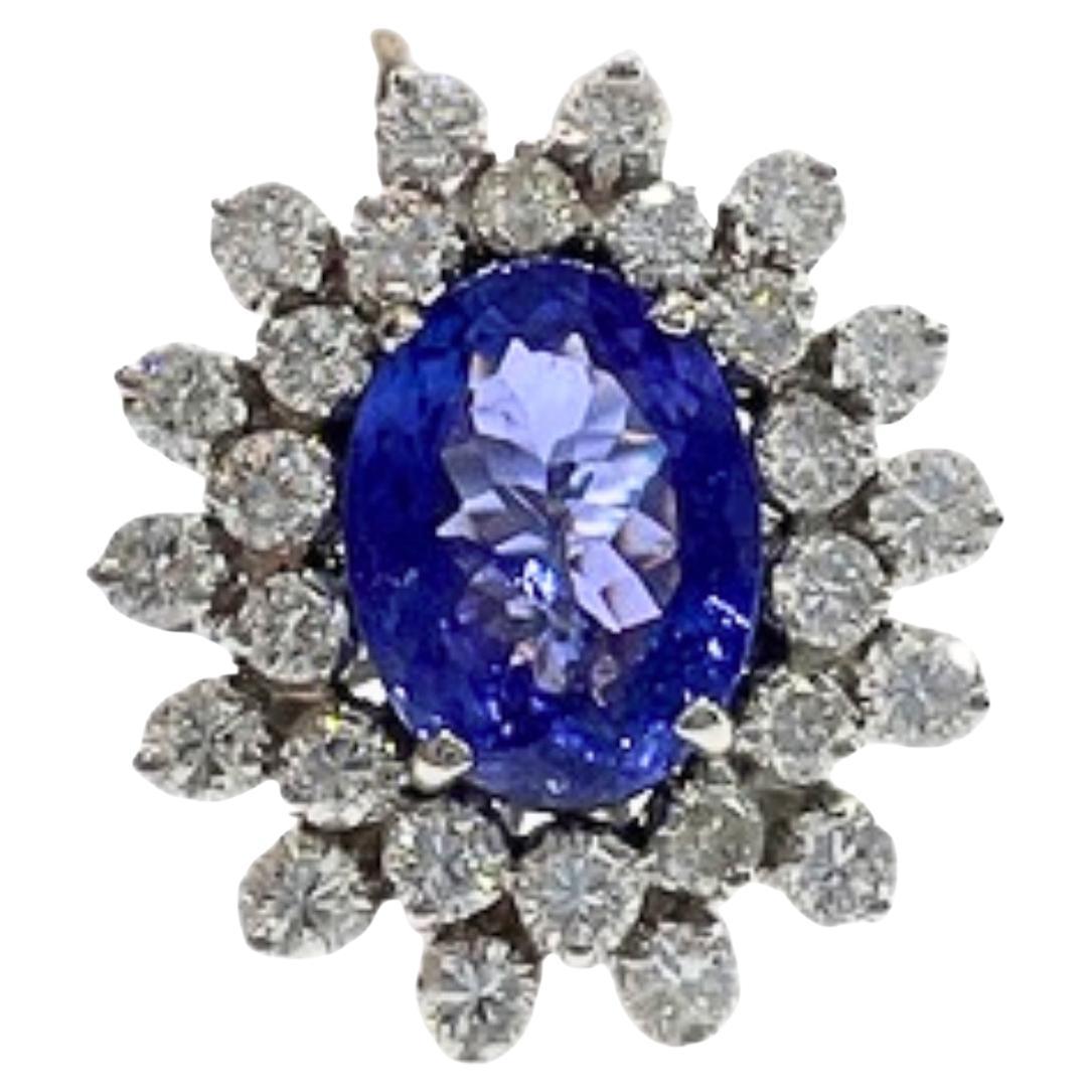 Anillo contemporáneo de oro de 18 quilates con diamantes y tanzanita