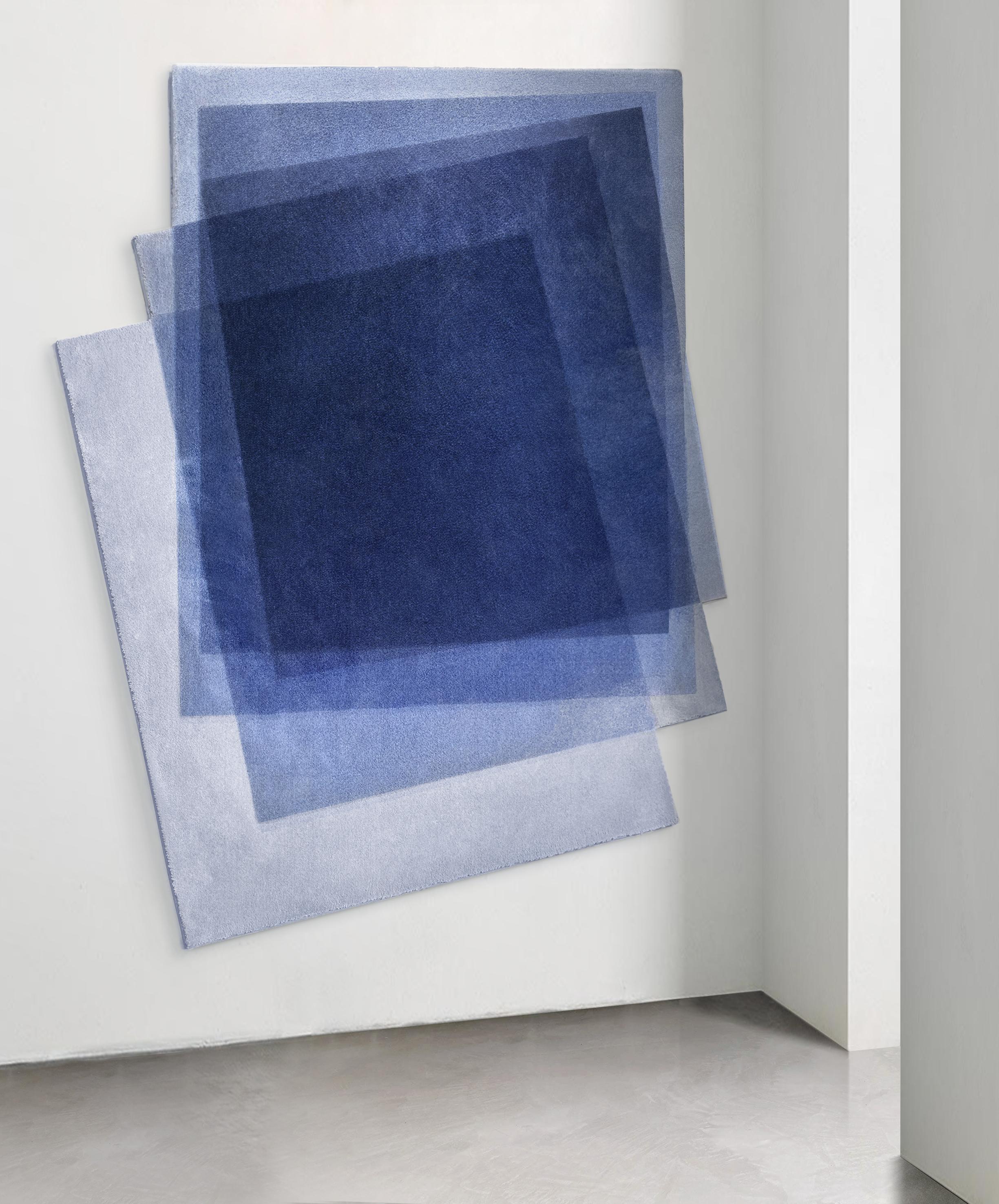 In our Sedimenti carpet, transparent surfaces overlap and stratify in what is perceived as a perpetual motion and a never-ending aspiration towards illusory forms of balance.
Through transparency and layering, an abstract geometric composition of