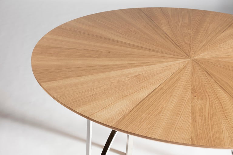 A wooden top supported by steel arches: these are the pure and essential elements of Archie table, designed by Serena Confalonieri for Medulum. The dynamic and light base is inspired by the trajectory of bouncing objects: a dance of sinuous