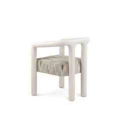 Poltrona da pranzo contemporanea con struttura in gesso e seduta imbottita