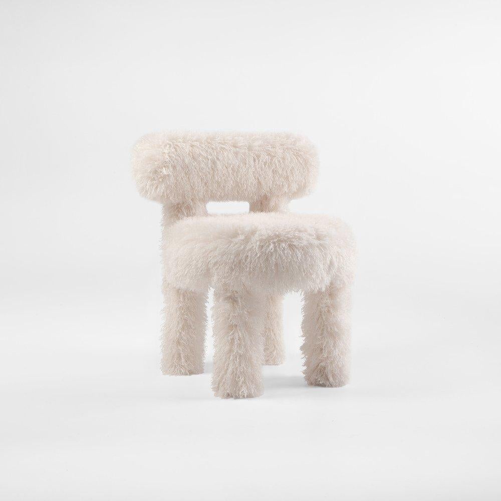 Chair Gropius CS1 Fluffy Edition

Designer: Kateryna Sokolova, 2024
Materials: wood, plywood, foam rubber, injection-molded soft foam, fabric
Fabric: Misia Azur Faux Fur
Color Scheme: CS1 - fully upholstered

Dimensions:
Height: 74 cm / 29,13