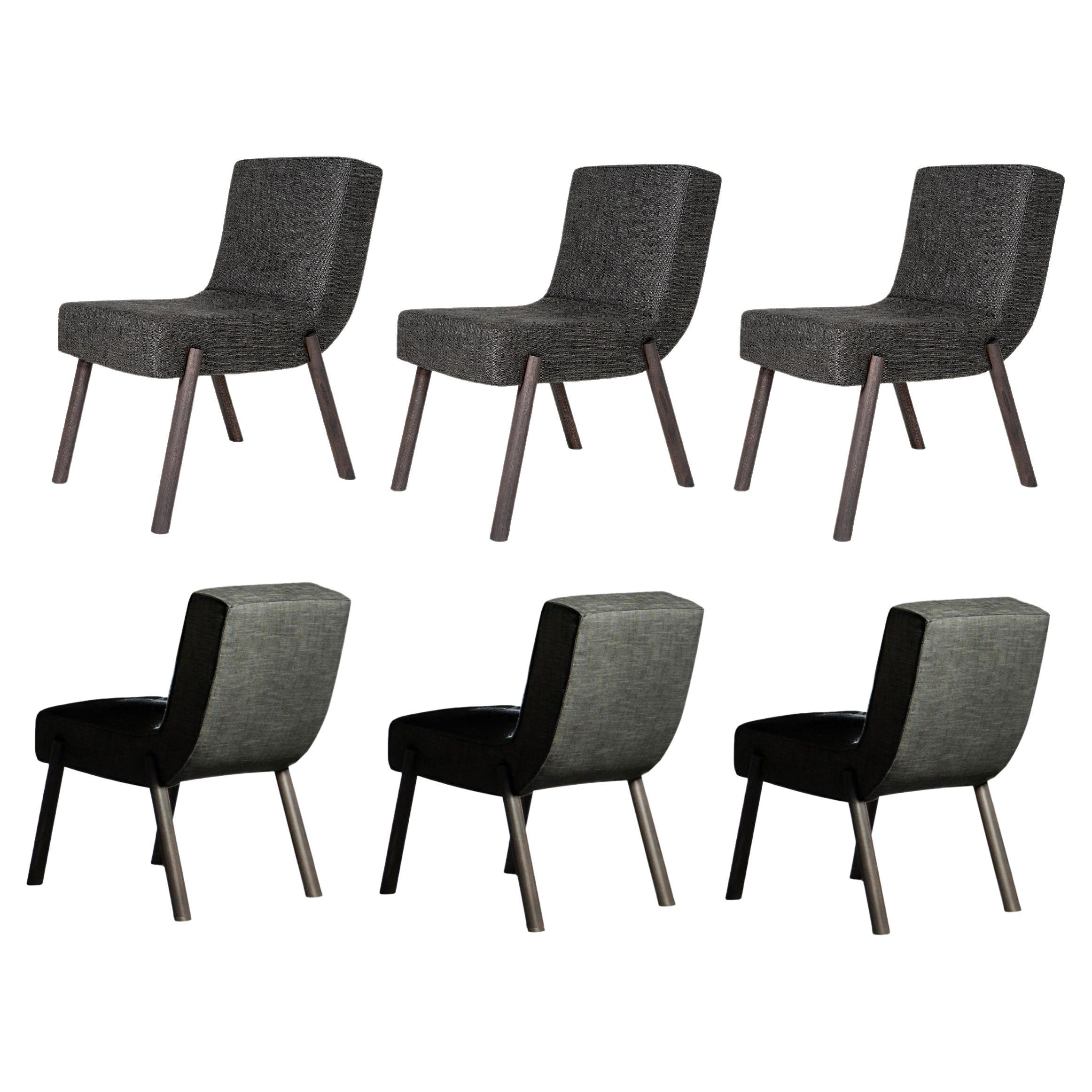 Comfortable dining chair upholstered in performance grey Lenin. 
Legs in dark grey solid oak.
Suitable for contract use.
100% European made product.
“Minimum order of 4 chairs.”
 Contact us to enquire about COM/COL production, requirements and