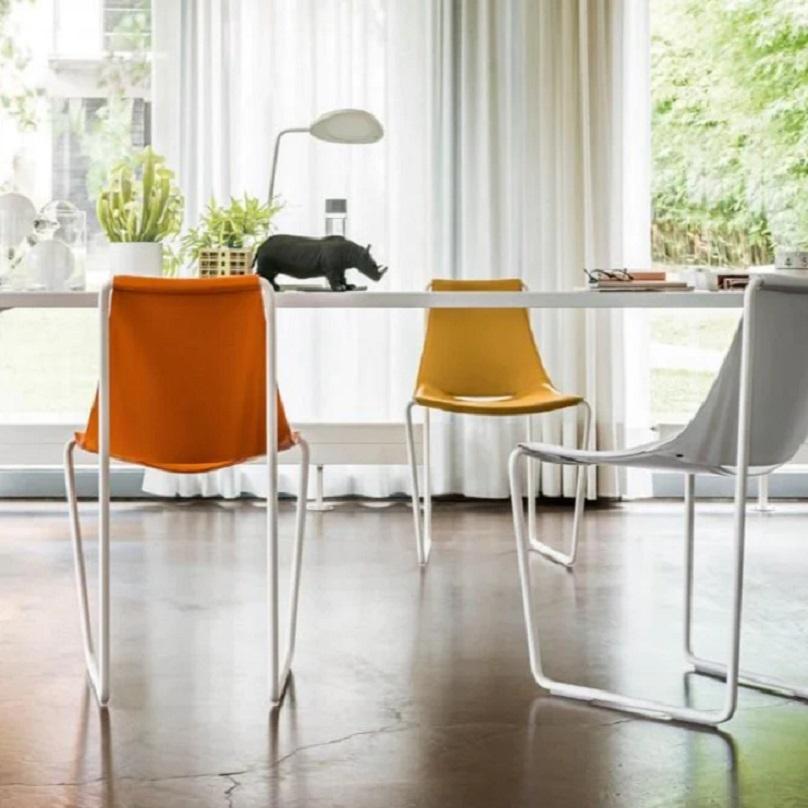 Italian Contemporary Dining Chair In Sled Base Offered In Leather For Sale