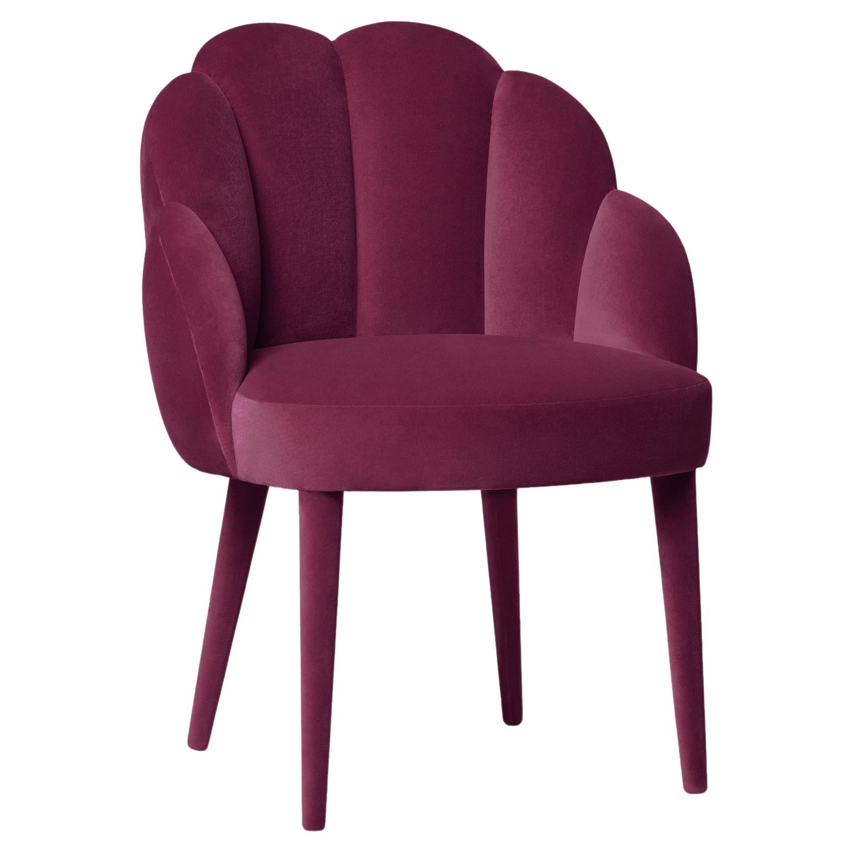 This dining chair redefines the need for curves in an interior. As playful as it is graceful, its superbly detailed segments in the front and reverse provide a plateau where the seat gently lays. An absolute must for a dining setting with a sense of