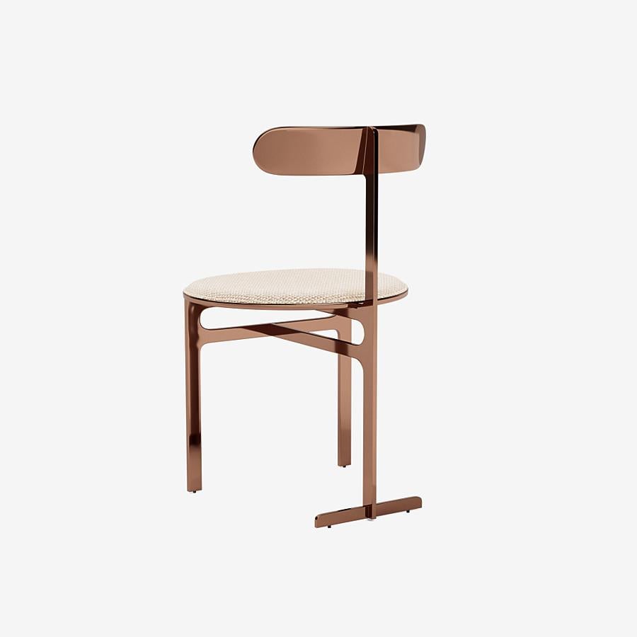 'Park Place' Chair by Man of Parts
Signed by Yabu Pushelberg

Dimensions: H. 65.3 x 63 x 57  cm
Seat height : 48 cm

Model shown: Sahco Safire 014, Polished rose copper 

A wide range of fabrics is available 
Metal finishes available: Matte black,