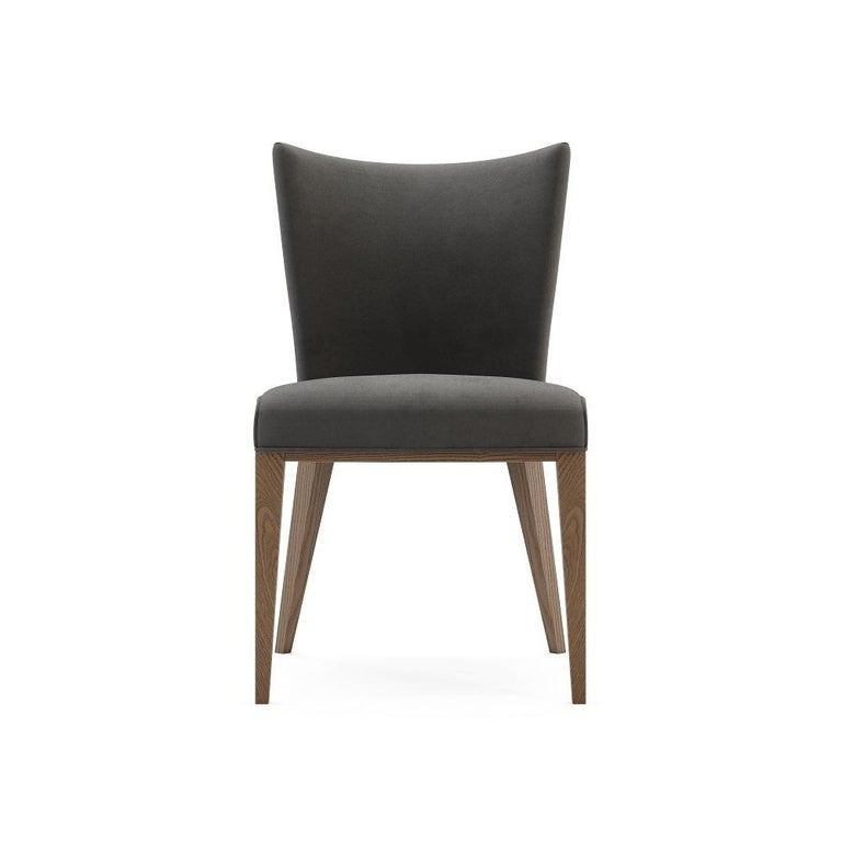 Timeless design in combination with handmade couture techniques. The dining chair features curved wooden upholstered back for greater comfort. Offered in fumed Oak frame and brick velvet that is resistant to stains and abrasion.
Fabrics: Brick