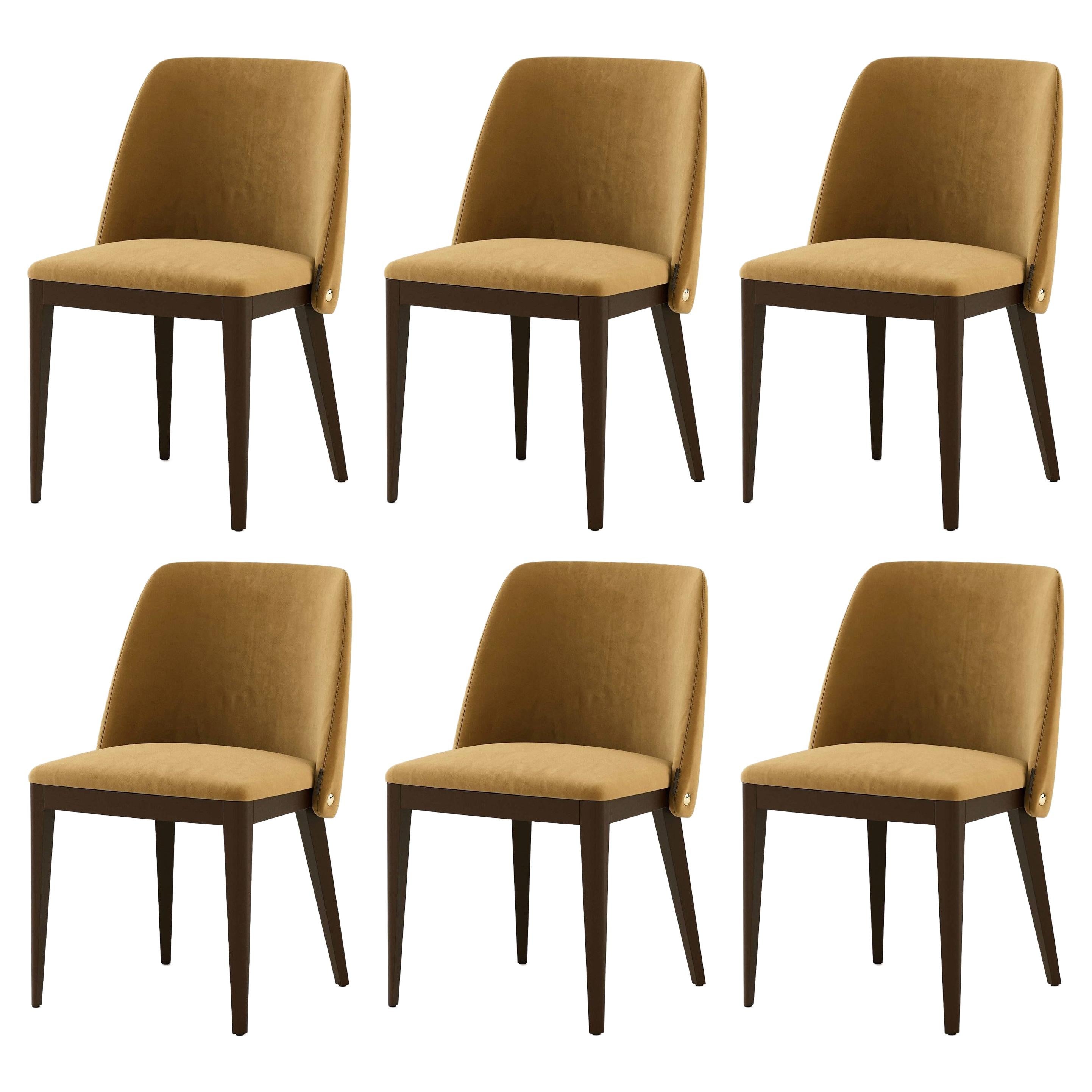 Sculptural design inspired by the work of Dutch architect Rem Koolhaas. 
Standard finishes
Fabrics: mud velvet
Structure: black oak
Studs: Gold.
“Minimum order of 4 chairs.”
Contact us to enquire about COM/COL production, requirements and material