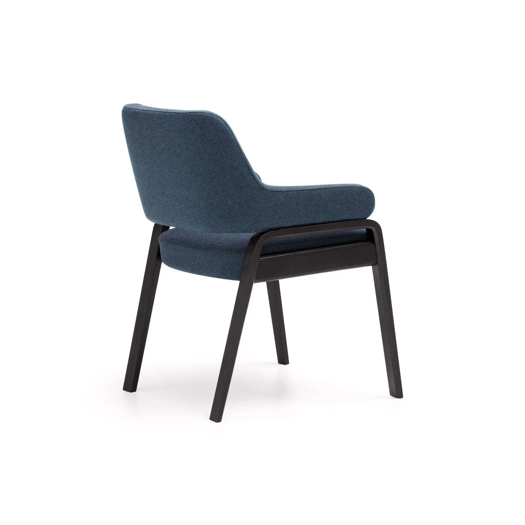 Contemporary and sophisticated line of dining armchair, lounge chair and dining bench. The design is structured around the legs, which support the seat and backrest. Two flat profiles run from the same point along the base and backrest in an