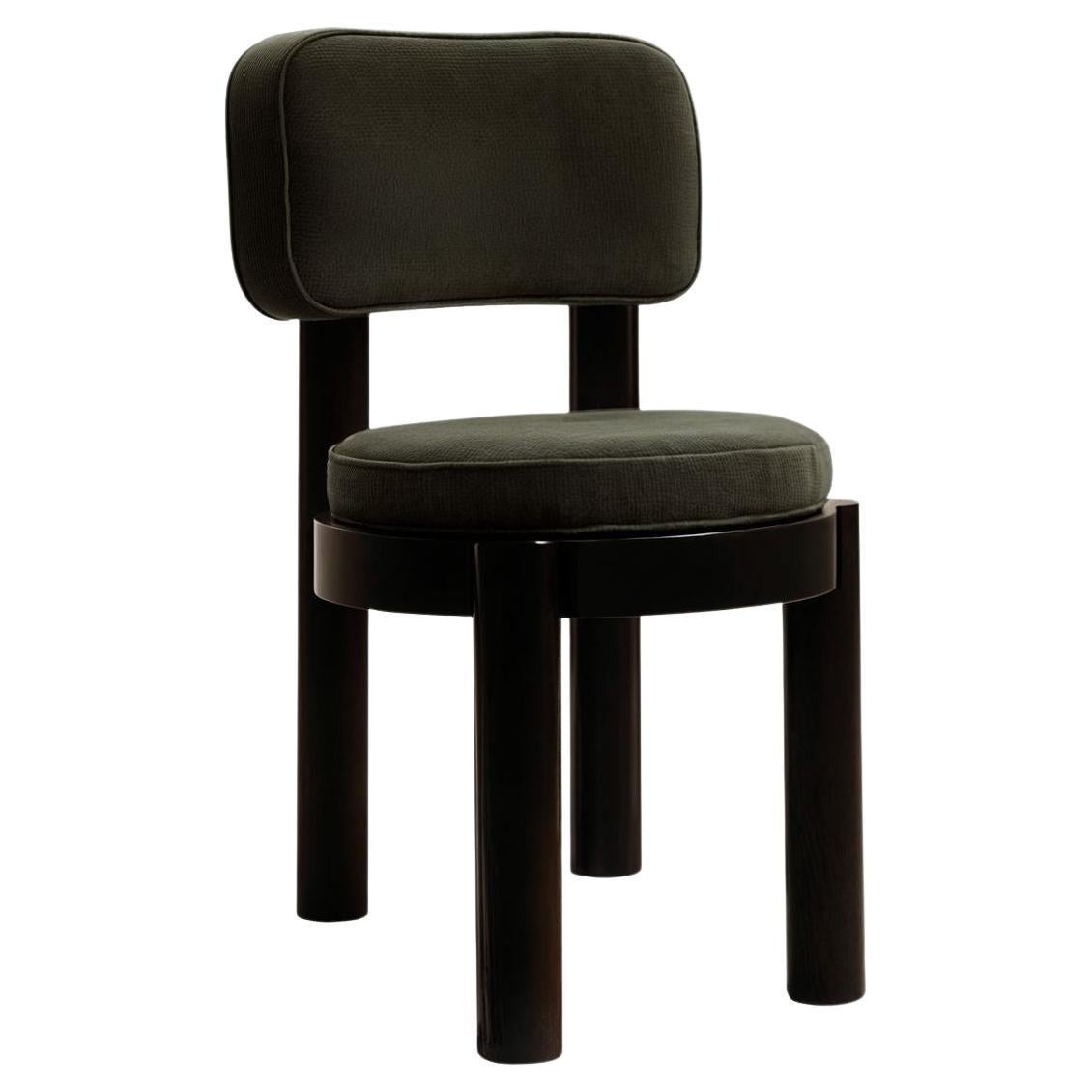 Contemporary Dining Chair Wenge Upholstered in Dark Green Velvet & Body Black 
The Fita Chair exudes quiet, understated elegance. Its simple yet chic aesthetic will suit any modern dining room setting.
Perfectly complementing the soft Fita Chair, it
