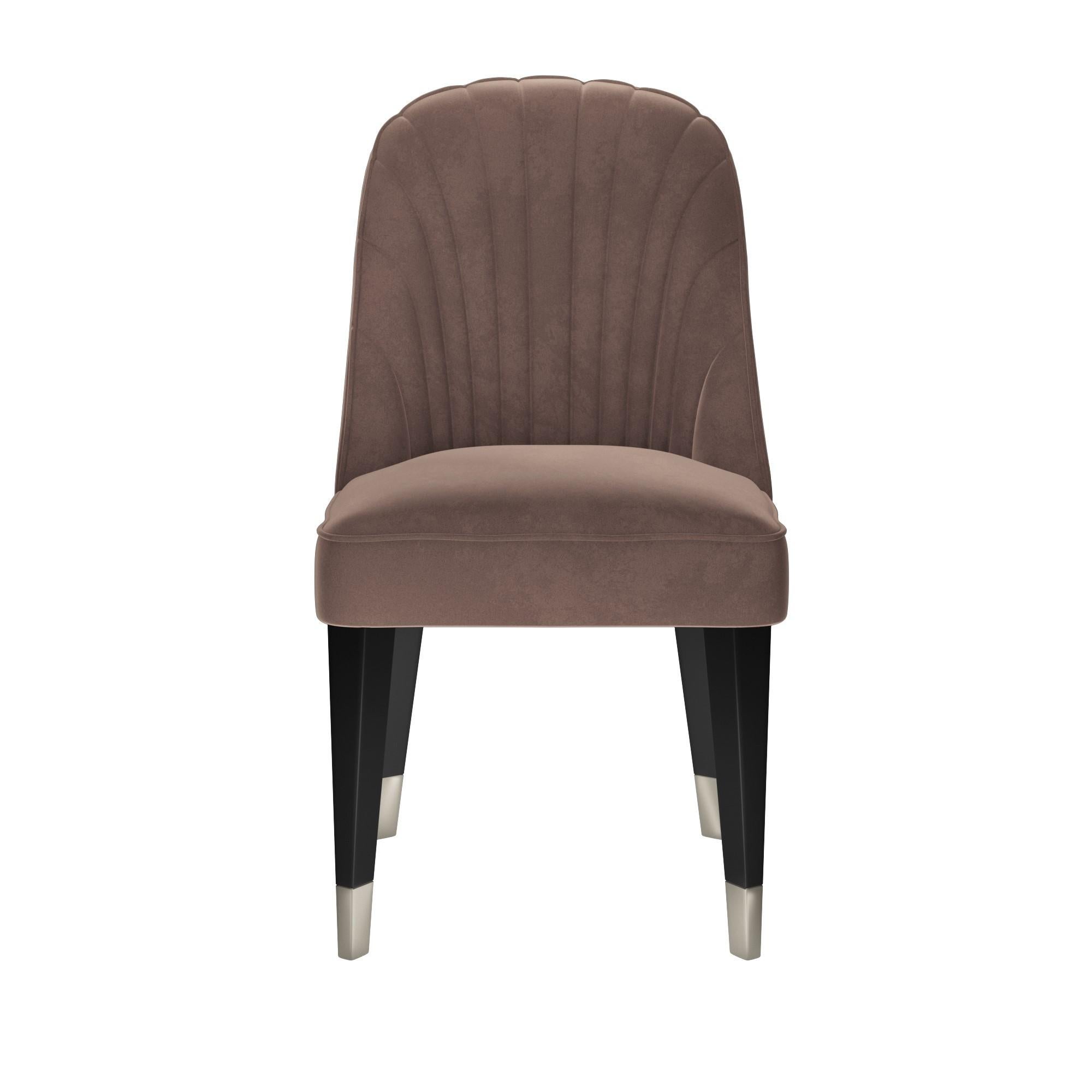 Contemporary dining chair featuring a sculptural curved back with tufted padding to achieve the perfect angle for relaxation. Upholstered in Lavender velvet with very soft alpaca wool look and feel. The velvet is stain resistant and water
