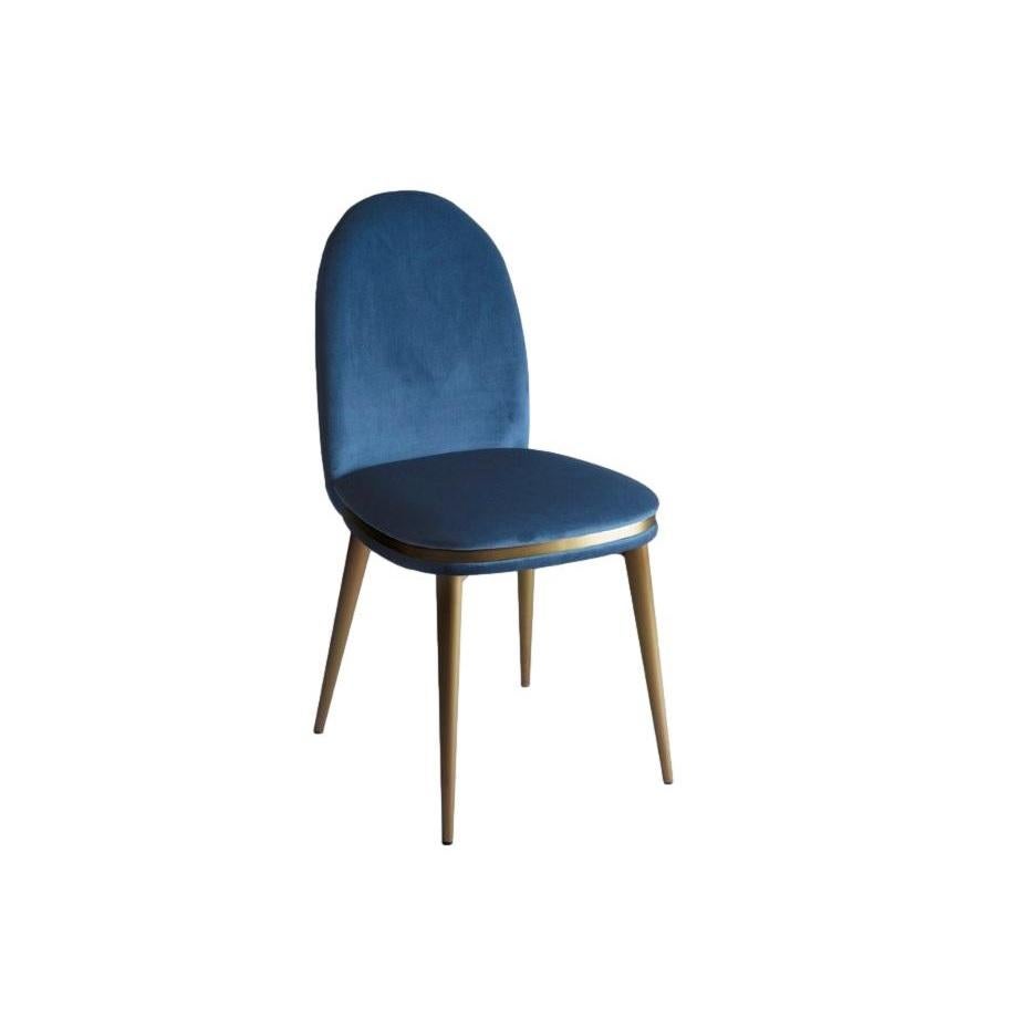 Dining chair enriched by sinuous shapes and geometries that come from the past with captivating lines, a refined design and great personality ideal for contract and home use. Gold metal base with upholstered seat & enveloping back.
Handcrafted in