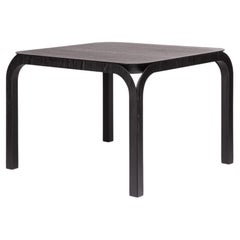 Acquabella dining table, in canaletto walnut by Viviana De Grandi for Medulum