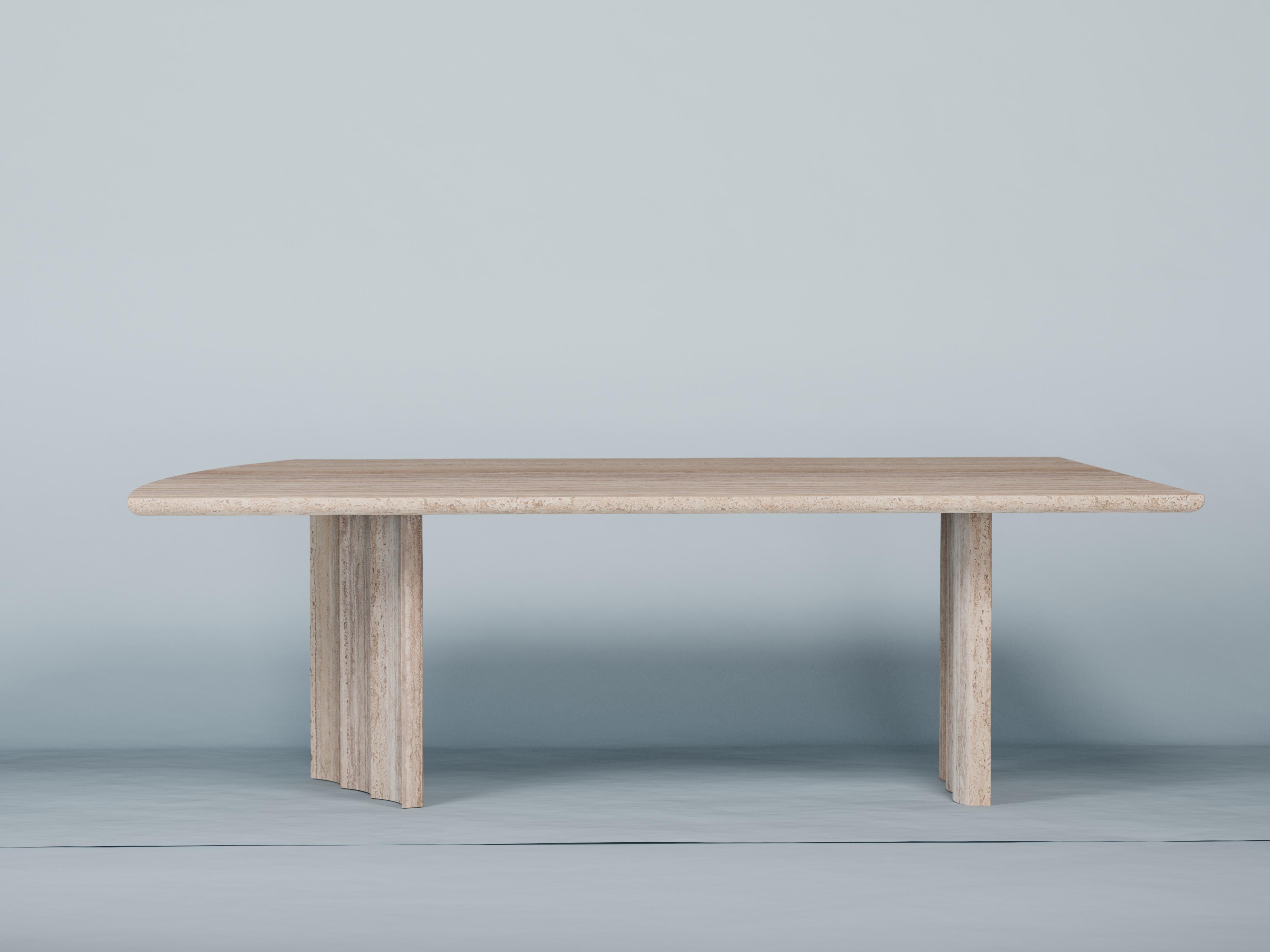 Roman Travertine dining table by Tino Seubert
Dimensions: D 240 x W 100 x H 73 cm.
Materials: Roman Travertine
The table top's surface is smooth and has an acid shield treatment to avoid staining. The table legs have a porous surface characteristic