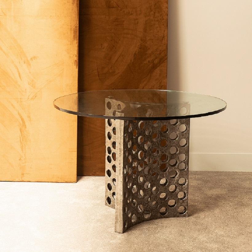 French Contemporary Dining Table Featuring A Cast Aluminum Base With Glass Surface For Sale