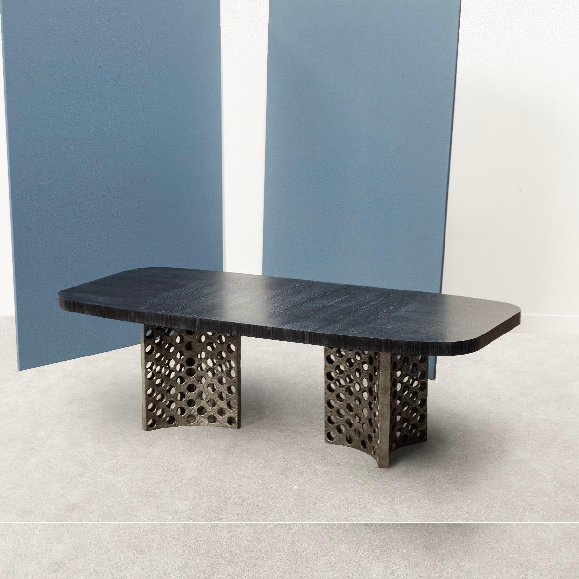 French Contemporary Dining Table Featuring A Cast Aluminum Base With Wood Surface For Sale