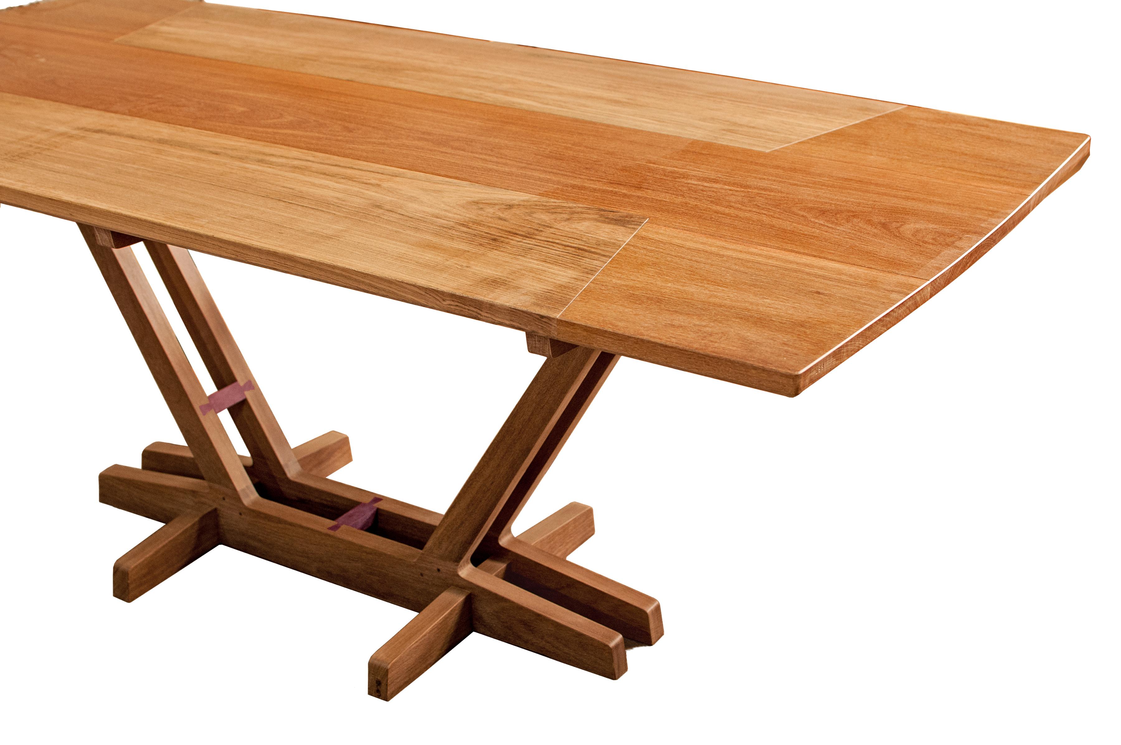 Dining table made with select tropical Brazilian hardwood by Ricardo Graham Ferreira.

Solid table top and base composed by two wood species assembled with traditional wood joints.

This dining table can be custom-made to fit specific dimensions.